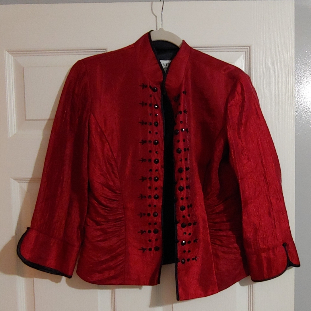 Red jacket J. R. Nites